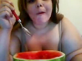 Hot girl eating watermelon