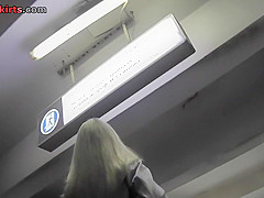 Hot legs of a foxy milf seen in free upskirt video