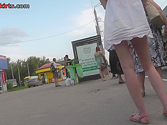 Hot upskirts views of a skinny teen 18+ in A-line skirt