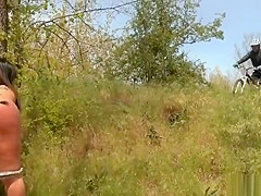 Huge ass brunette spanked in woods