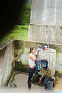 Indian Village Girl Bathing Near Water Tank Outdoor