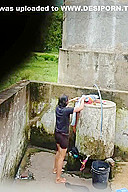 Indian Village Girl Bathing Near Water Tank Outdoor