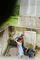 Indian Village Girl Bathing Near Water Tank Outdoor