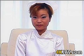 Japanese Nurse Vibrating Her Pussy