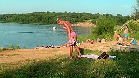 Jennifer in outdoor sex video with a couple fucking on a beach