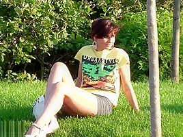 Jeny Smith flashes in a park