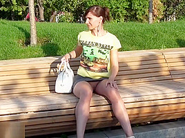 Jeny Smith flashes in a park