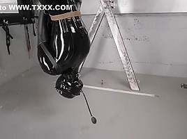 Latex slave upside down
