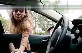 Latina girl masturbates a driver through the window