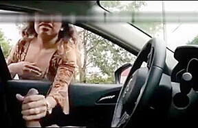 Latina girl masturbates a driver through the window