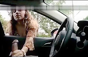Latina girl masturbates a driver through the window