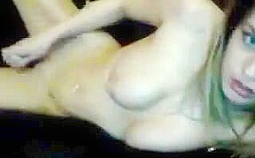 Legs behind head as girl fucks pussy with toy