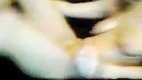 Legs behind head as girl fucks pussy with toy