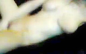Legs behind head as girl fucks pussy with toy