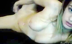 Legs behind head as girl fucks pussy with toy