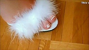 MILF housemaid showing her sexy feet in mules