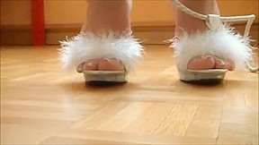 MILF housemaid showing her sexy feet in mules