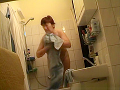 Mature lady dries off