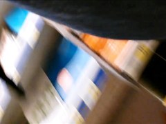 Mature upskirt stockings in supermarket