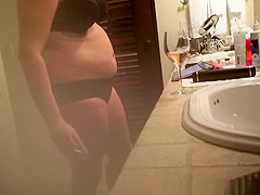 Mature wife spied in bathroom smoking and drinking