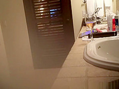 Mature wife spied in bathroom smoking and drinking