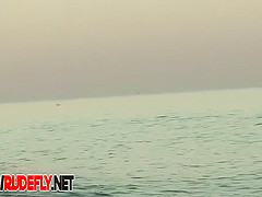 Milf Filmed At A Nudist Beach While Taking Off Her Top Nice