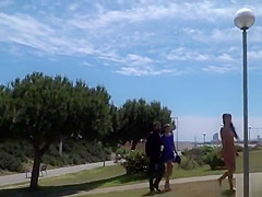 Nude Spanish beauty walked on the beach