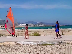 Nude Spanish beauty walked on the beach