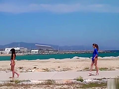 Nude Spanish beauty walked on the beach