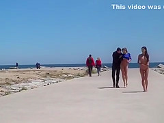 Nude Spanish beauty walked on the beach