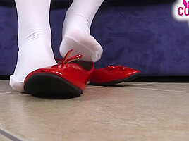 Nurse in white stockings massages her feet and teases you