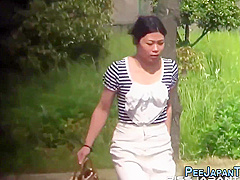 Oriental Slut Caught Pee