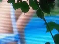 Peeping a topless neighbor cleaning pool