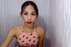 Petite Asian Shemale Cutie With Some Tattoos Tugs Her Dick On Webcam