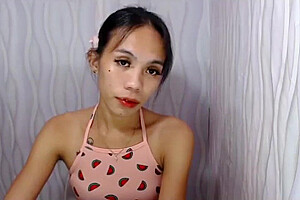 Petite Asian Shemale Cutie With Some Tattoos Tugs Her Dick On Webcam