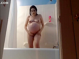 Pregnant Woman Taking A Shower