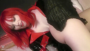 Pvc Clad Redhead Femdom Owns Submissive Lover With Cane And Magic Wand Vibrator