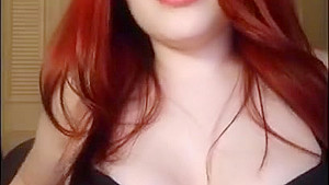 Red Head Jessica Sage Plays With Her Huge Tits