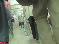 Red head gal shows off g-string in candid upskirts