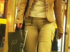 Round and tight woman ass in brown pants video