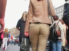 Round and tight woman ass in brown pants video