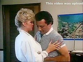 Saucy young Amber Lynn loves to get into a fuck fest with John Leslie