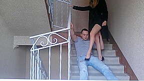 Sexy ballbusting on stairs