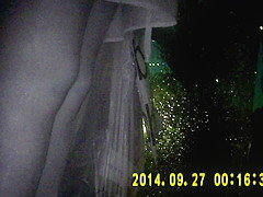 Shiny black pantyhose in night vision