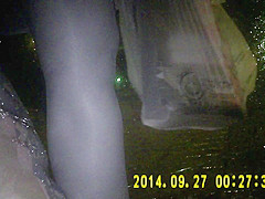 Shiny black pantyhose in night vision