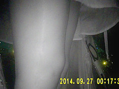Shiny black pantyhose in night vision