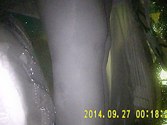 Shiny black pantyhose in night vision