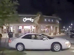 Skinny exhibitionist undresses in a fast food parking lot