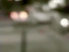 Skinny exhibitionist undresses in a fast food parking lot