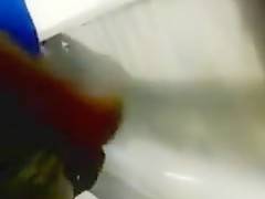 Strangers Stroking at the Urinal